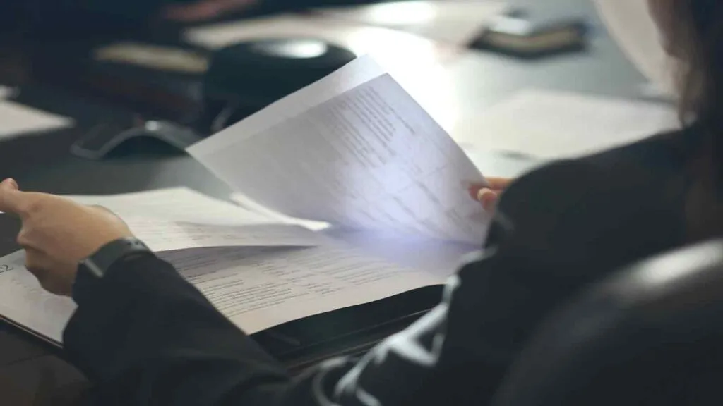 Lender reviewing recorded construction documents, since a title update reports what has been recorded rather than proving no claim exists