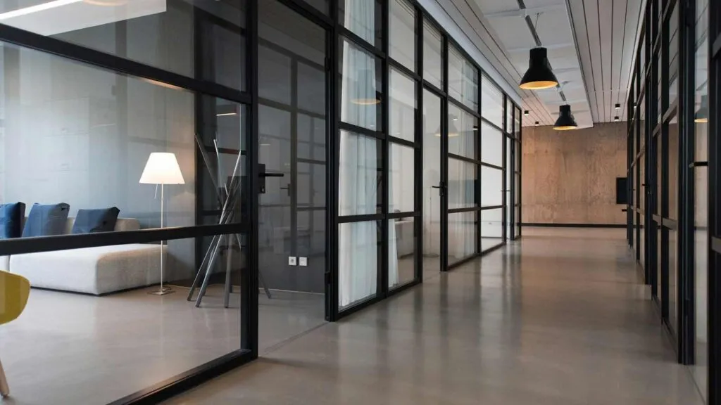 Modern office interior with glass walls Deed Ownership