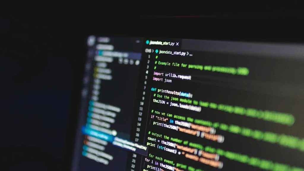 a computer screen with colorful code JSON